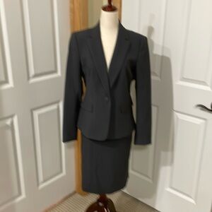 Nine West suit. Gray in color. Jacket size 4, skirt size 6.